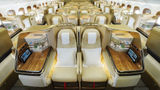 All seats in the refurbished business-class cabin come with their own minibar, among other enhancements.