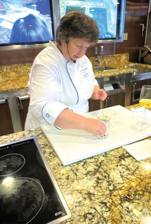 Master chef Stephanie Hersh, a former executive assistant to Julia Child, leading a class in the ship's cooking school. Master chef Stephanie Hersh, a former executive assistant to Julia Child, leading a class in the ship's cooking school.