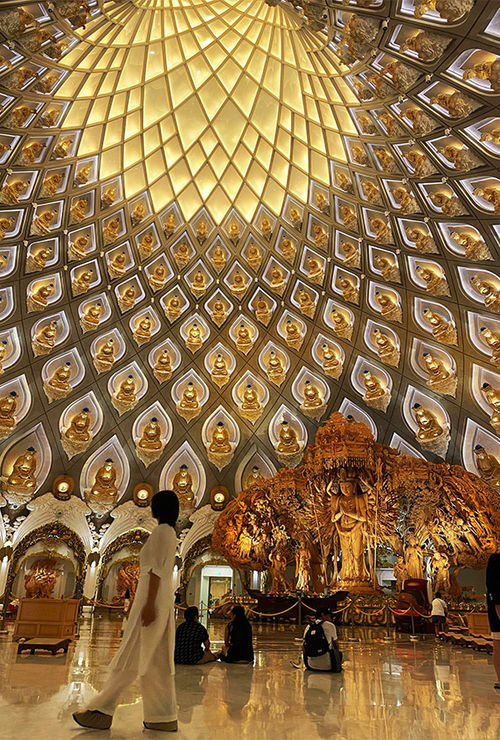 More than 200 Buddhas line the interior wall of the the Guanyin Altar in Zhoushan, China. More than 200 Buddhas line the interior wall of the the Guanyin Altar in Zhoushan, China.